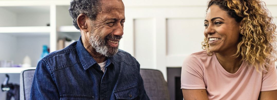 older gentleman with young woman.