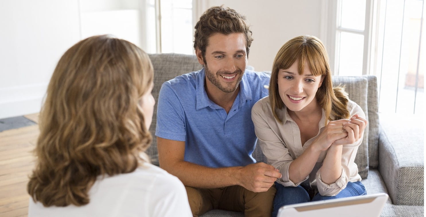 couple talking to female 